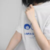 A man in a t-shirt that reads "I am a child of God," standing against a neutral background.